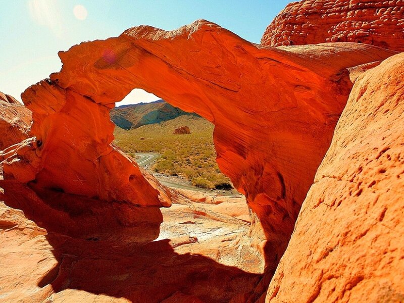 Red rock arch in desert