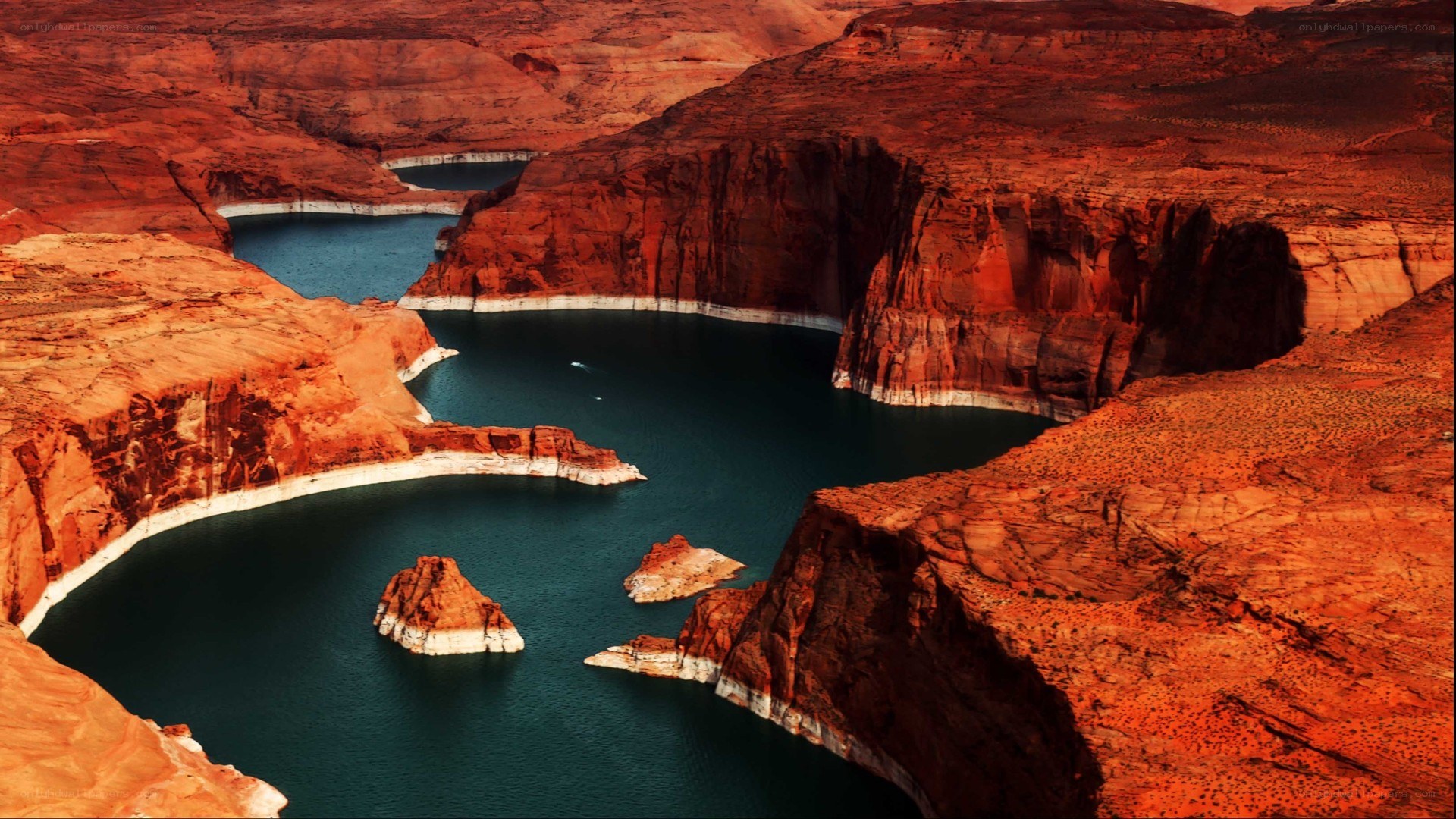 Red rock canyon with blue water