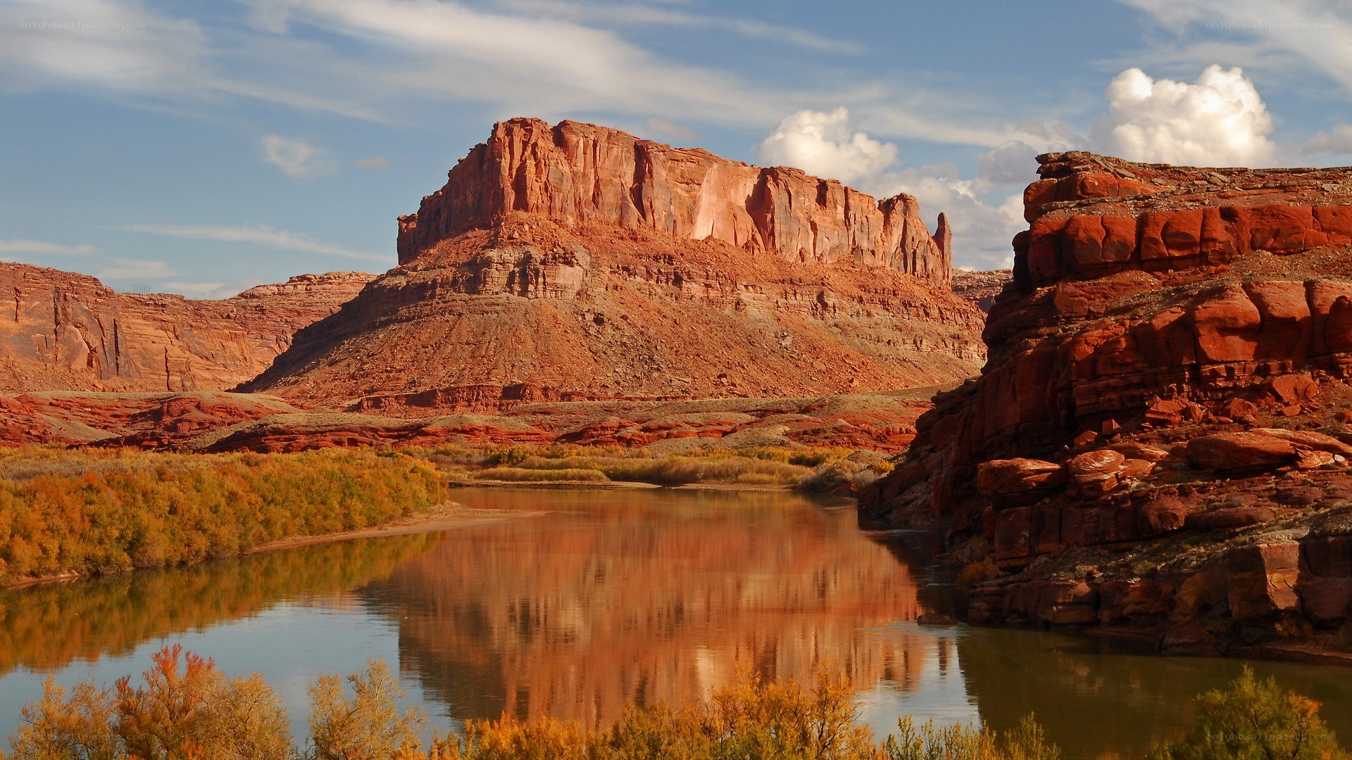 Red rock canyon with river reflection