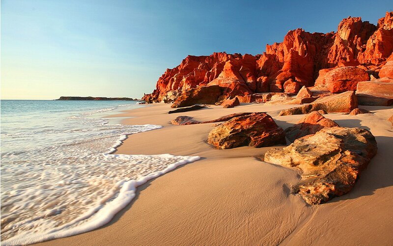Red Rock Cliffs on Beach