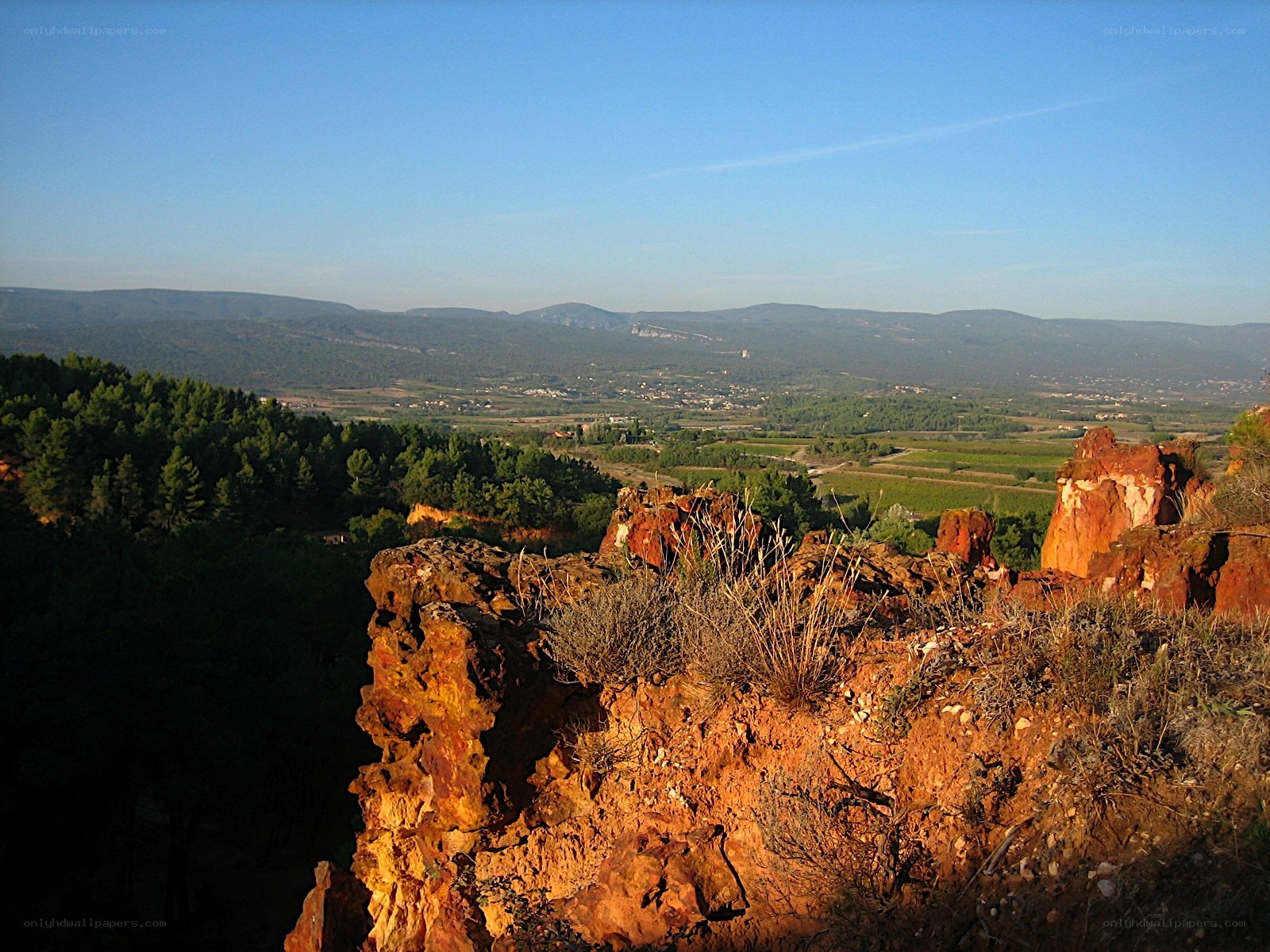Red rock cliffs overlooking valley