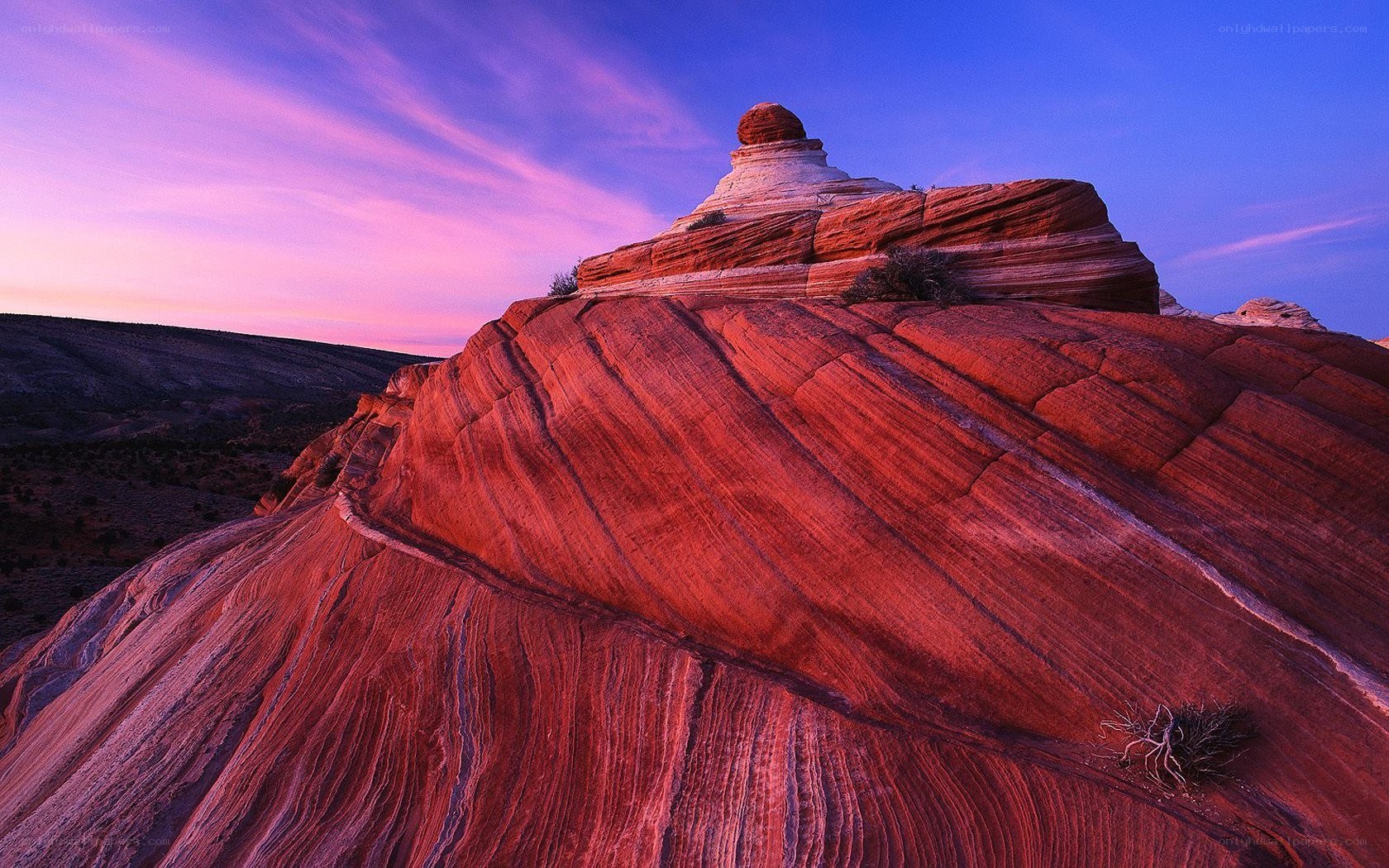 Red rock formation at sunset