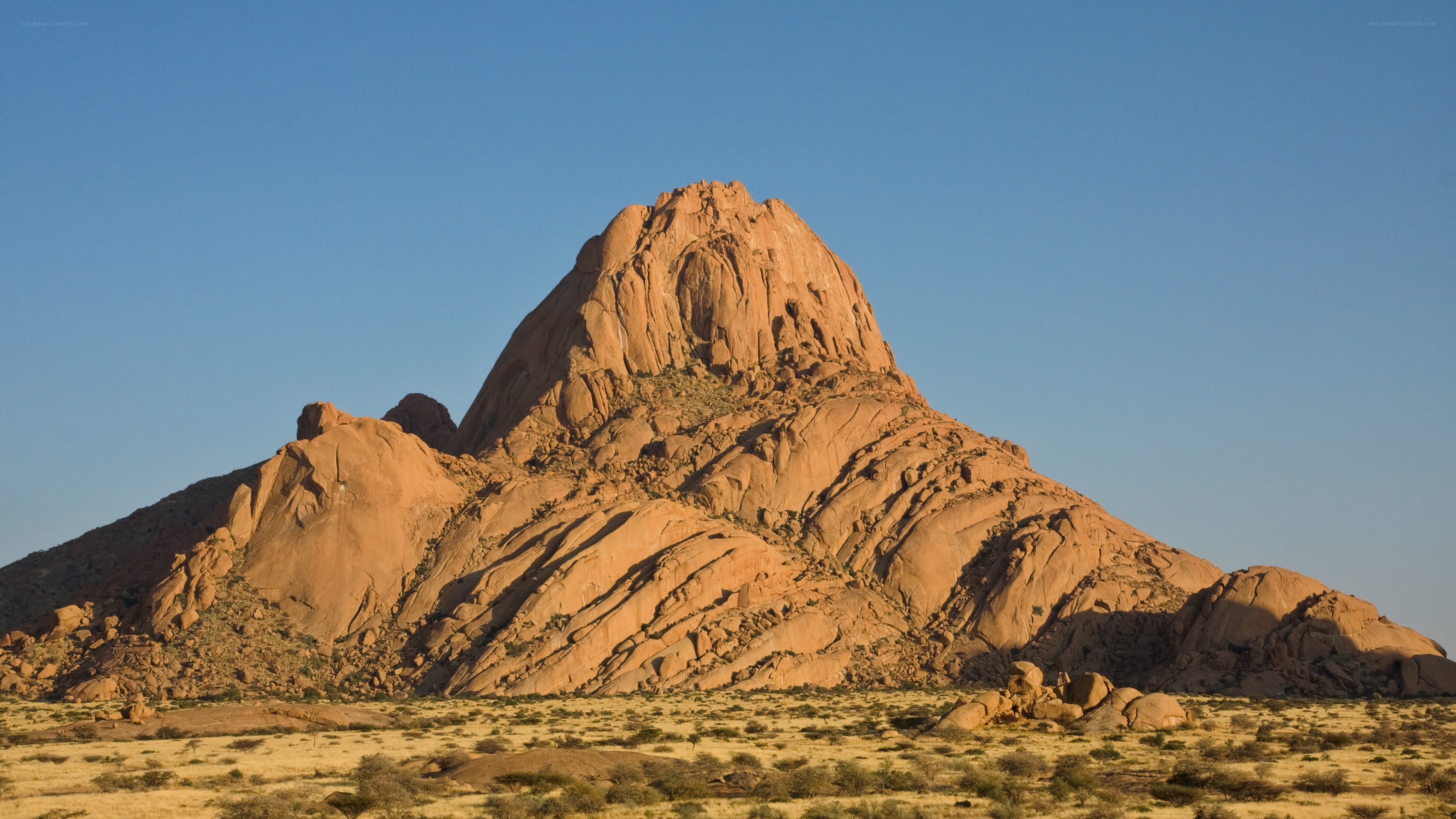 Red rock formation in desert