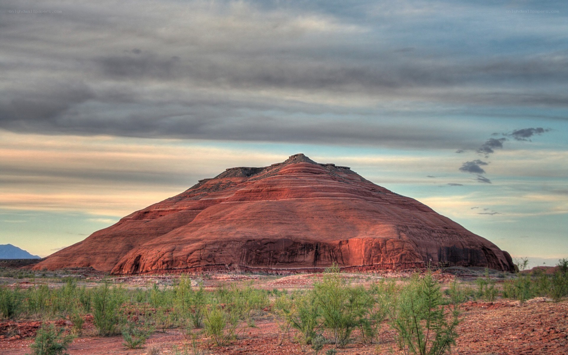 Red rock formation in desert