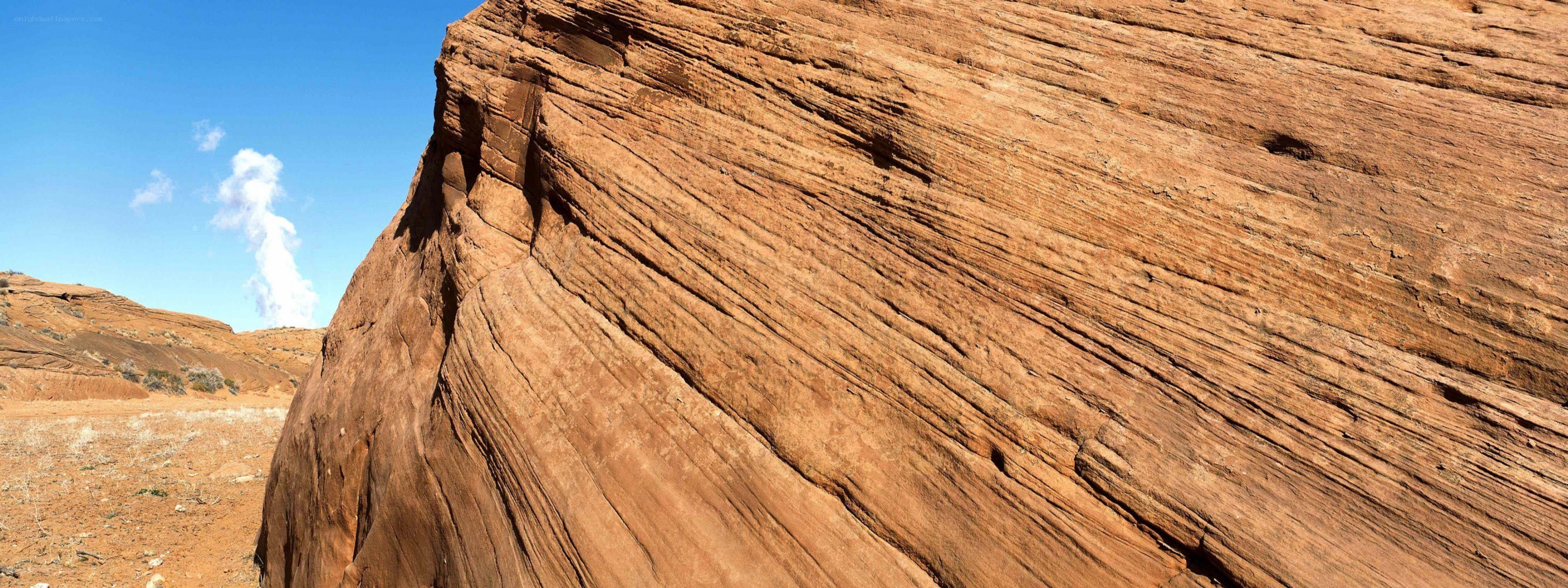 Red rock formation in desert
