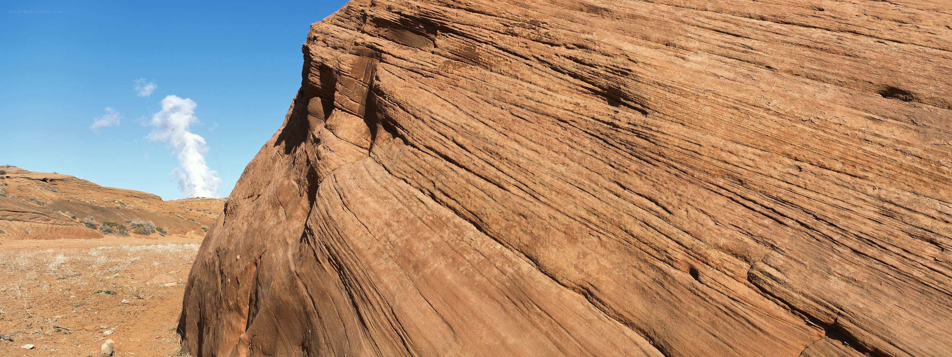 Red rock formation in desert