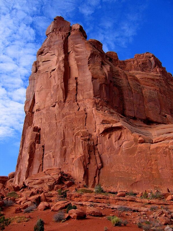 Red rock formation under blue sky
