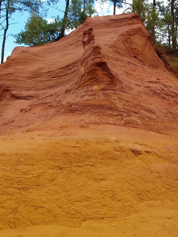 Red rock formation with layered strata