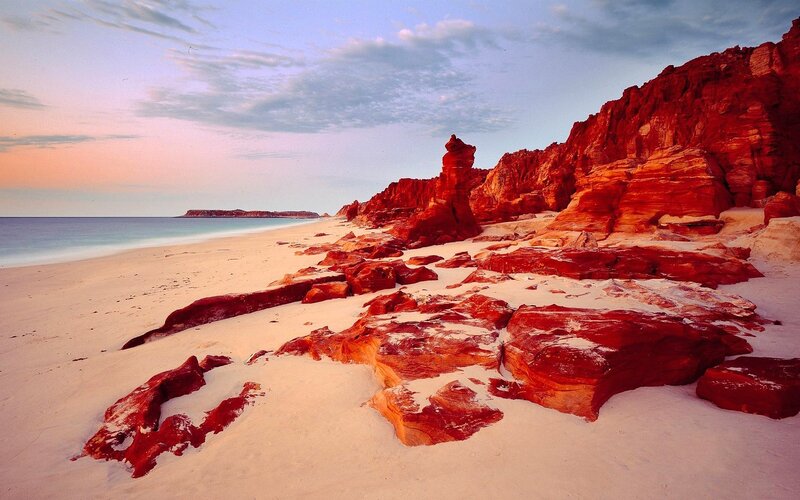 Red Rock Formations on Beach — Serene, Sunset, Photograph, Ocean, Cliffs