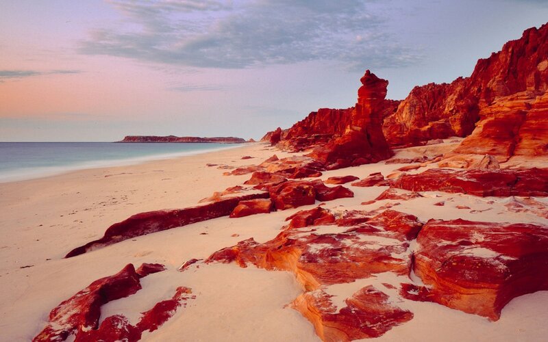 Red Rock Formations on Beach — Serene, Sunset, Photograph