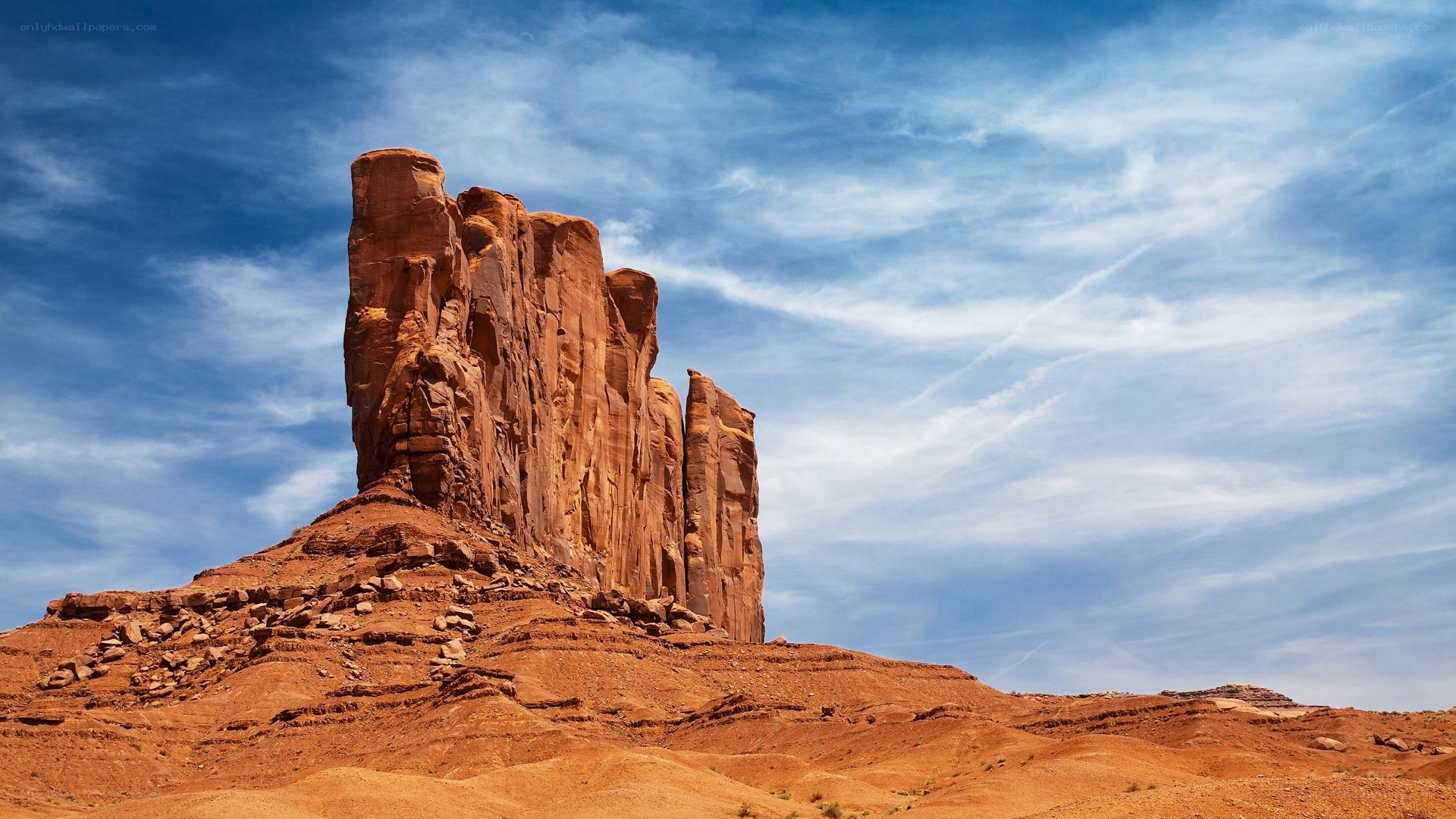 Red rock formations under blue sky