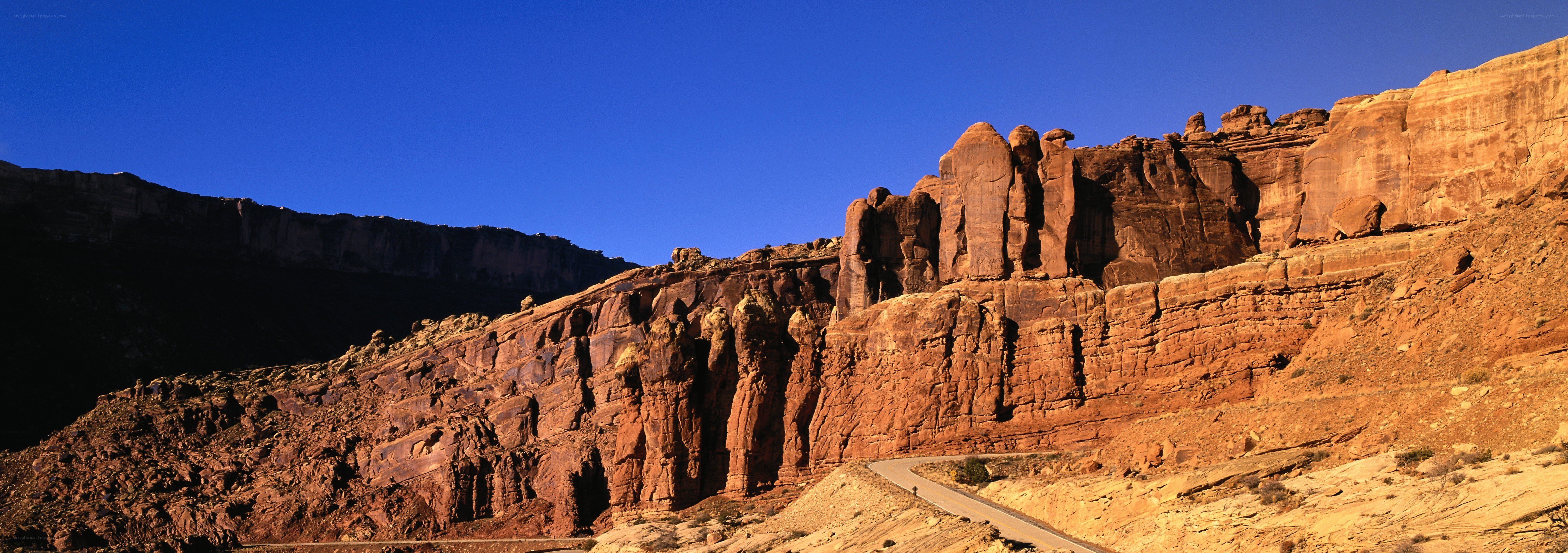 Red rock formations under blue sky