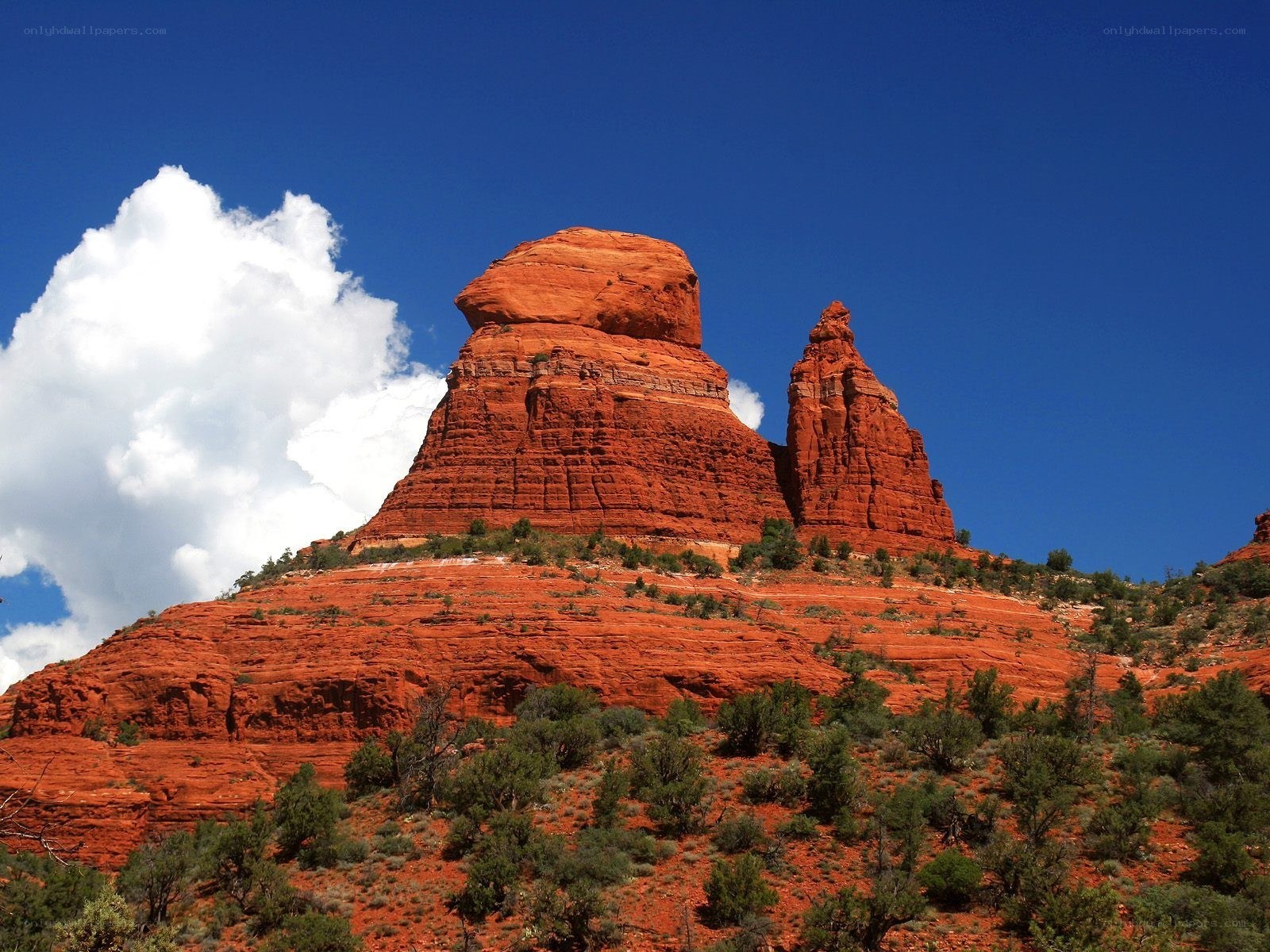 Red rock formations under blue sky