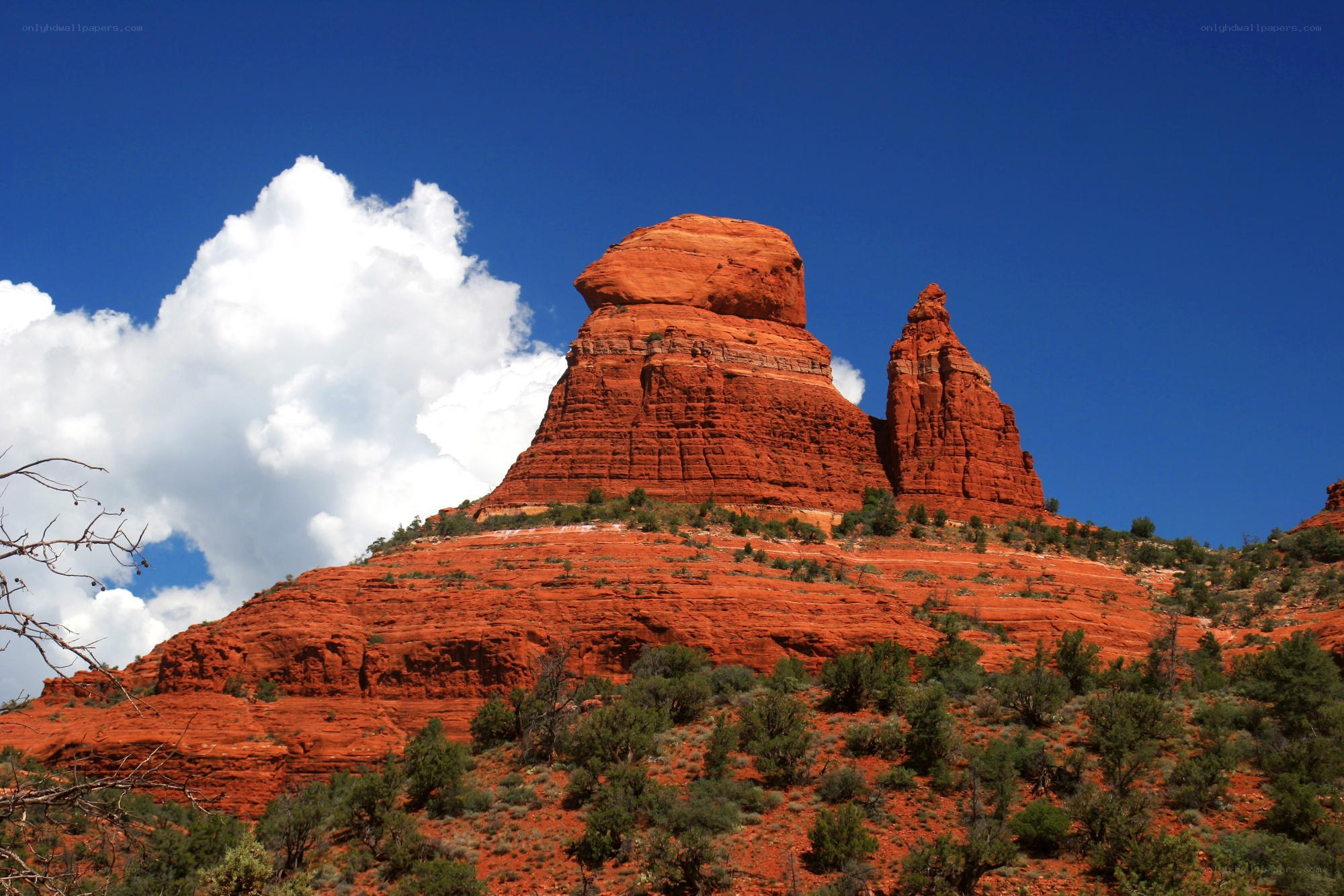 Red rock formations under blue sky