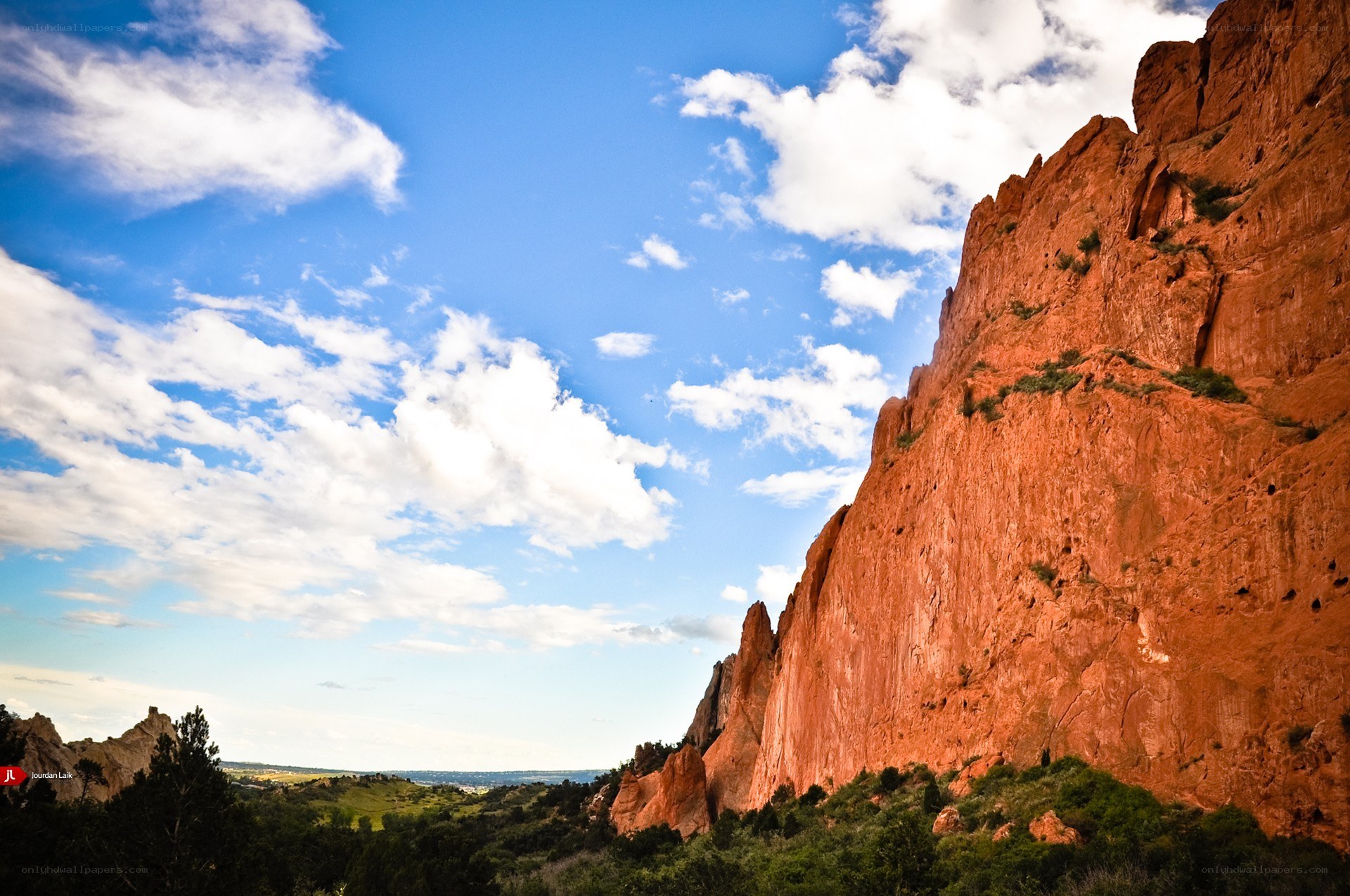 Red rock formations under blue sky