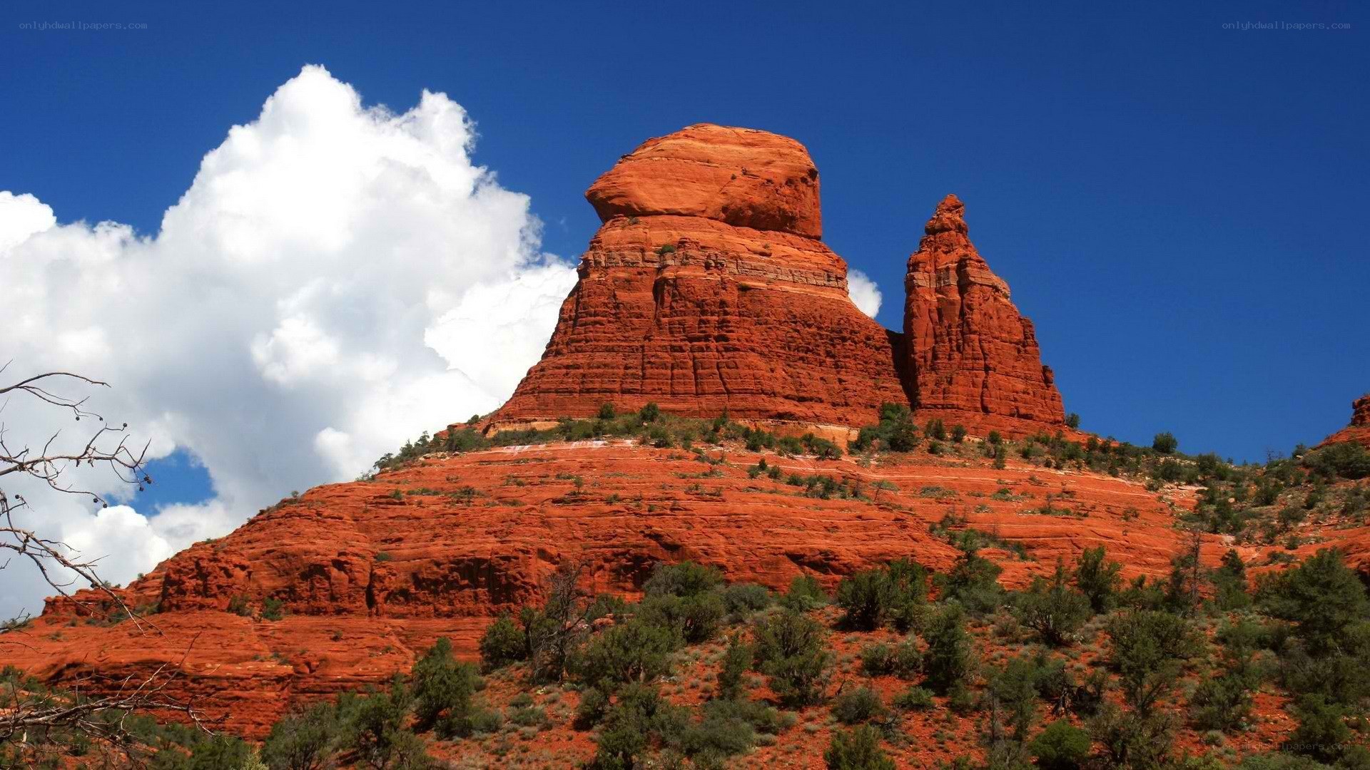 Red rock formations under blue sky