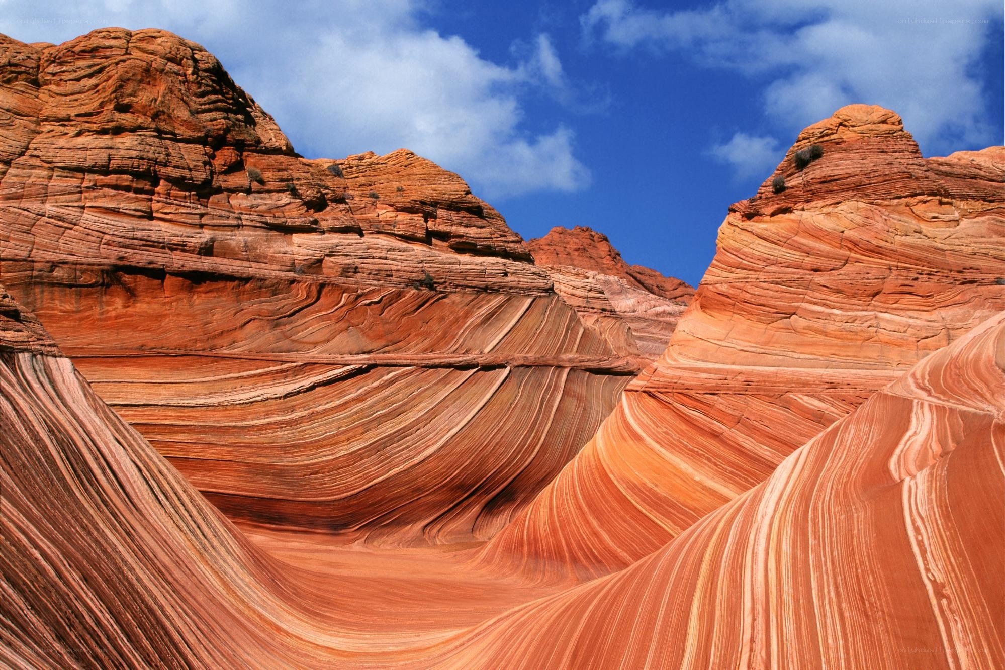 Red rock formations under blue sky