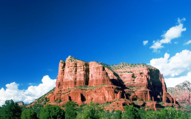 Red rock formations under blue sky