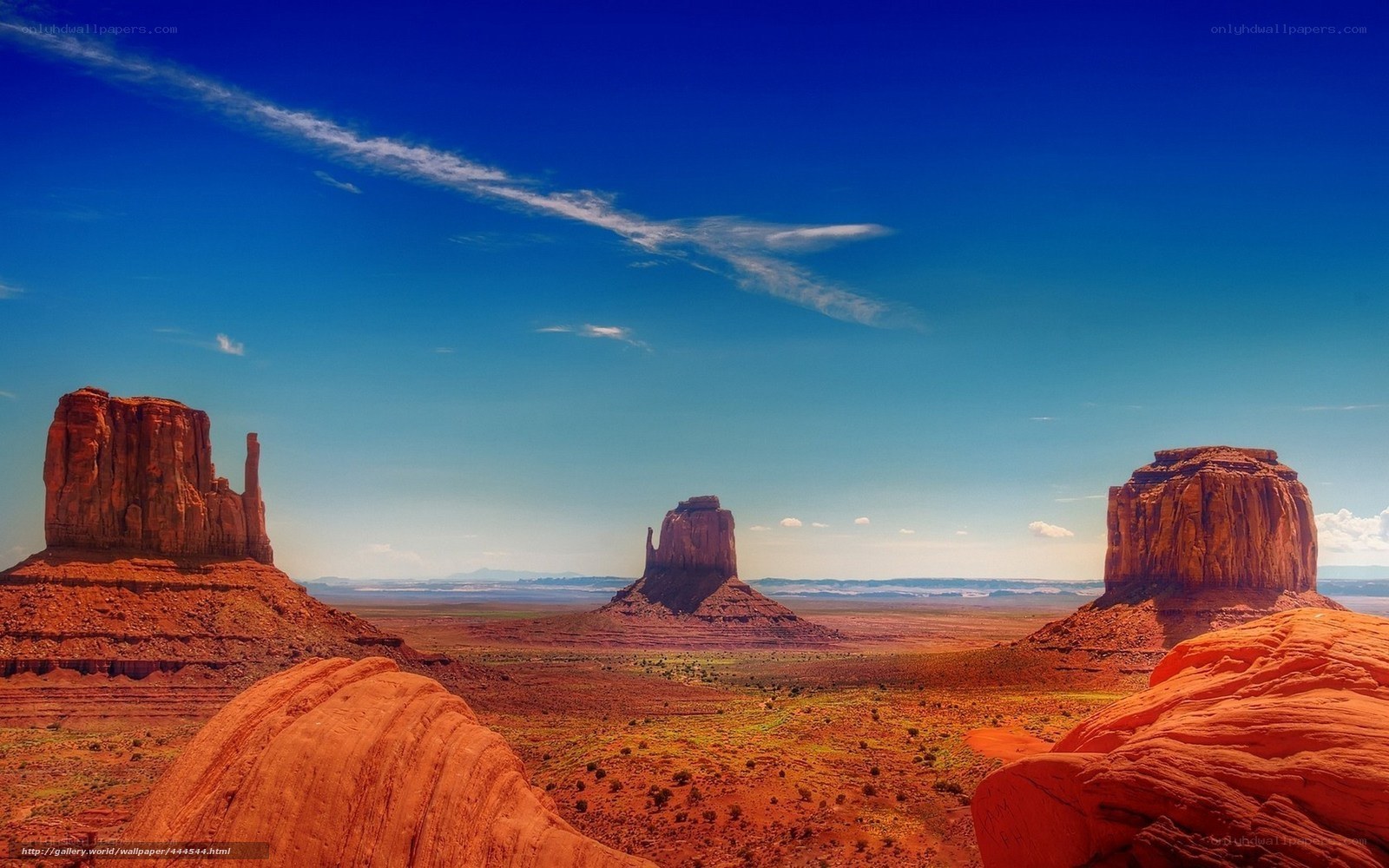 Red rock formations under blue sky