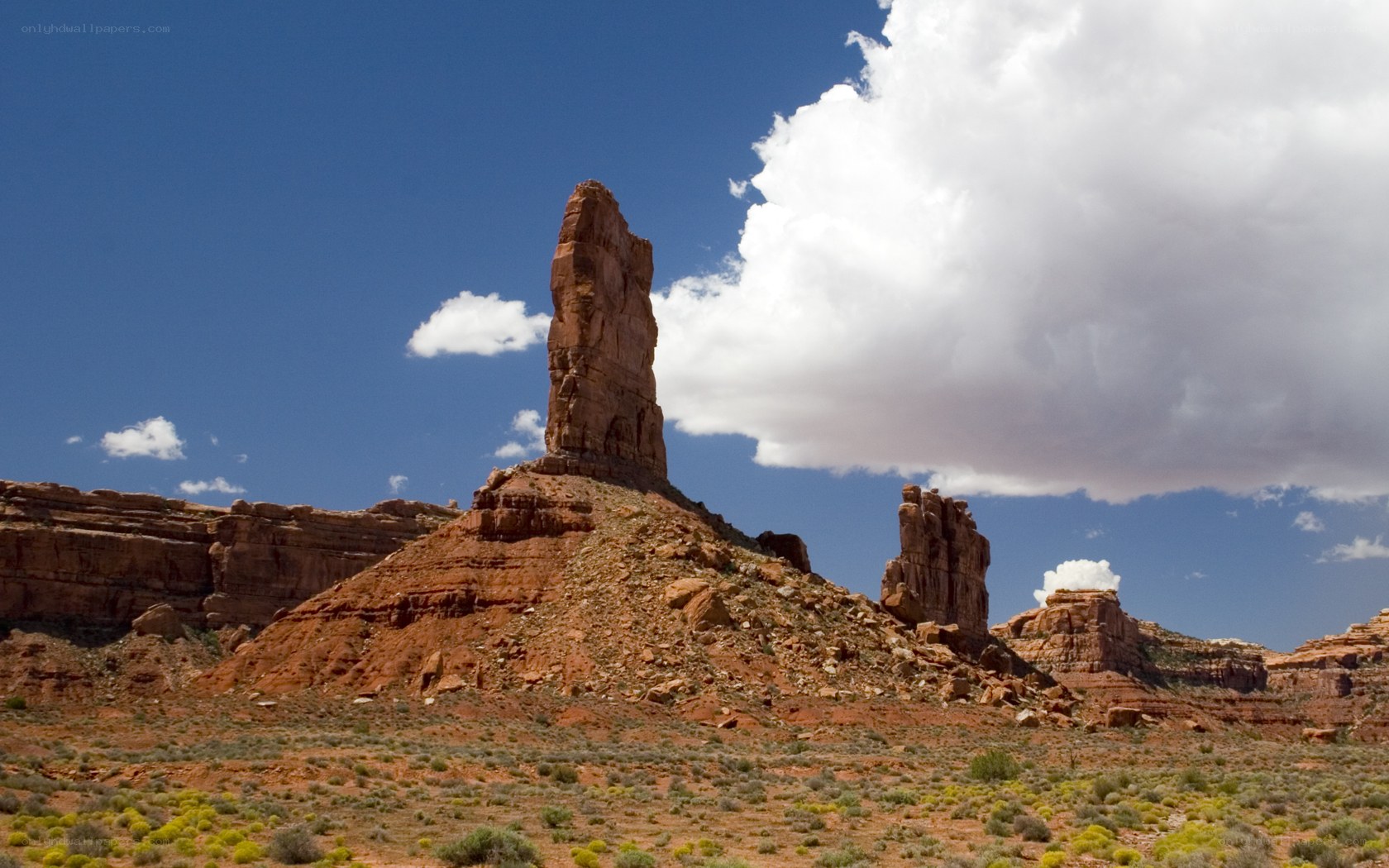 Red rock formations under blue sky