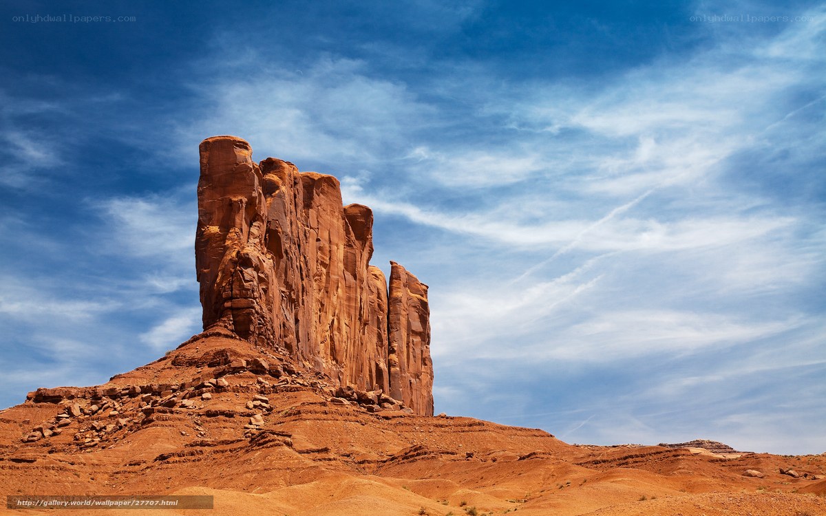 Red rock formations under blue sky