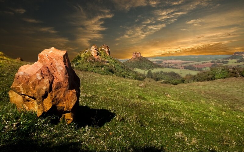Red Rock in Grassy Field — Green
