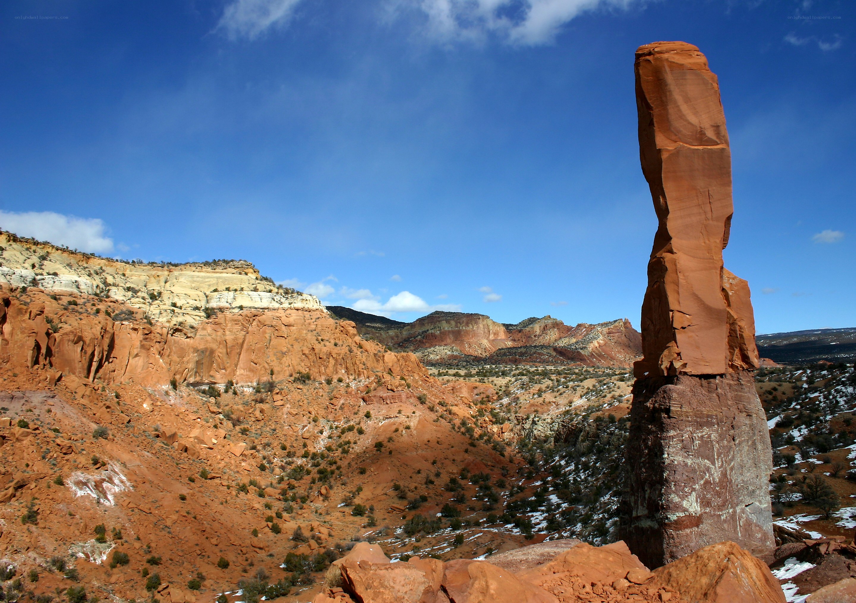 Red rock spire in desert canyon