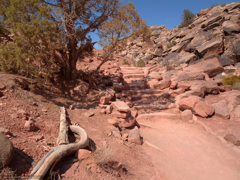 Red rock trail with stone steps
