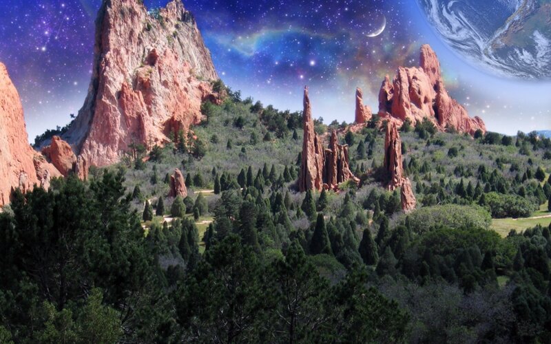 Red rocks under starry sky