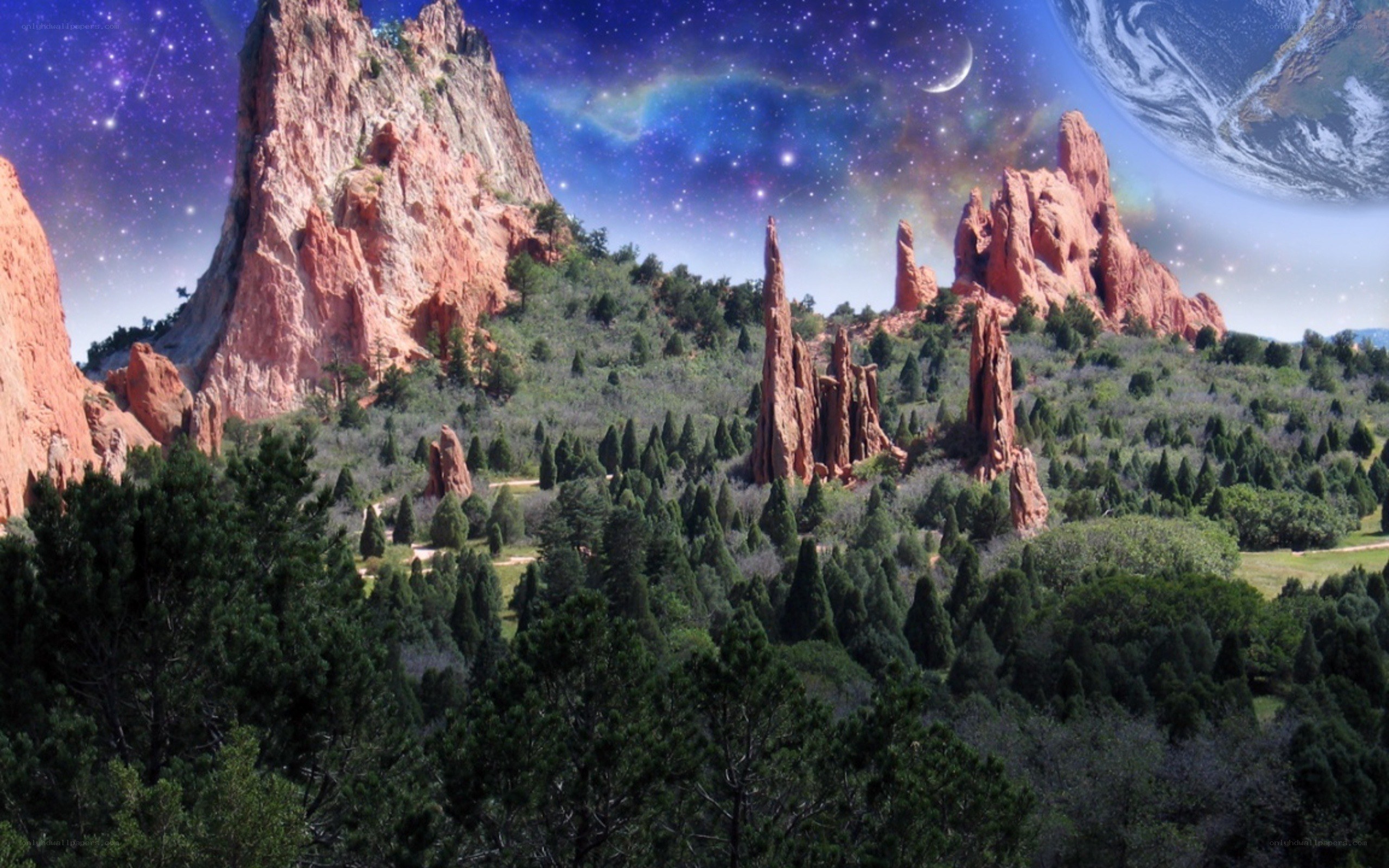 Red rocks under starry sky