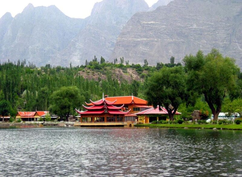 Red-roofed Building on Lake