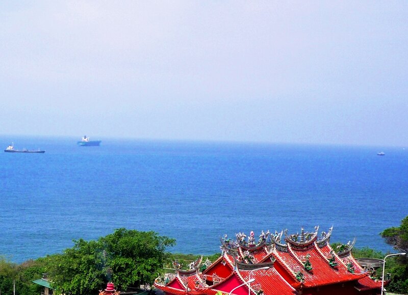 Red-roofed Temple by Sea