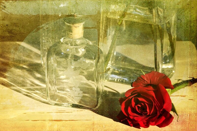 Red Rose and Glass Bottles