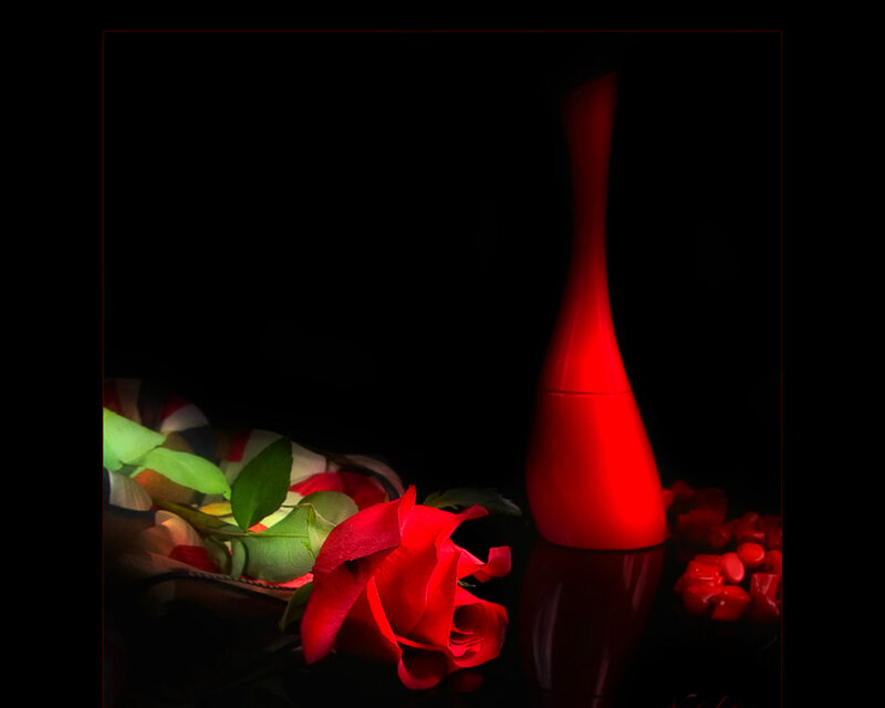 Red Rose and Perfume Bottle — Dramatic