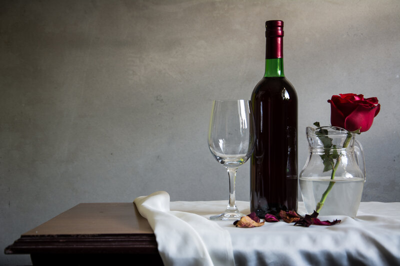 Red Rose and Wine Bottle