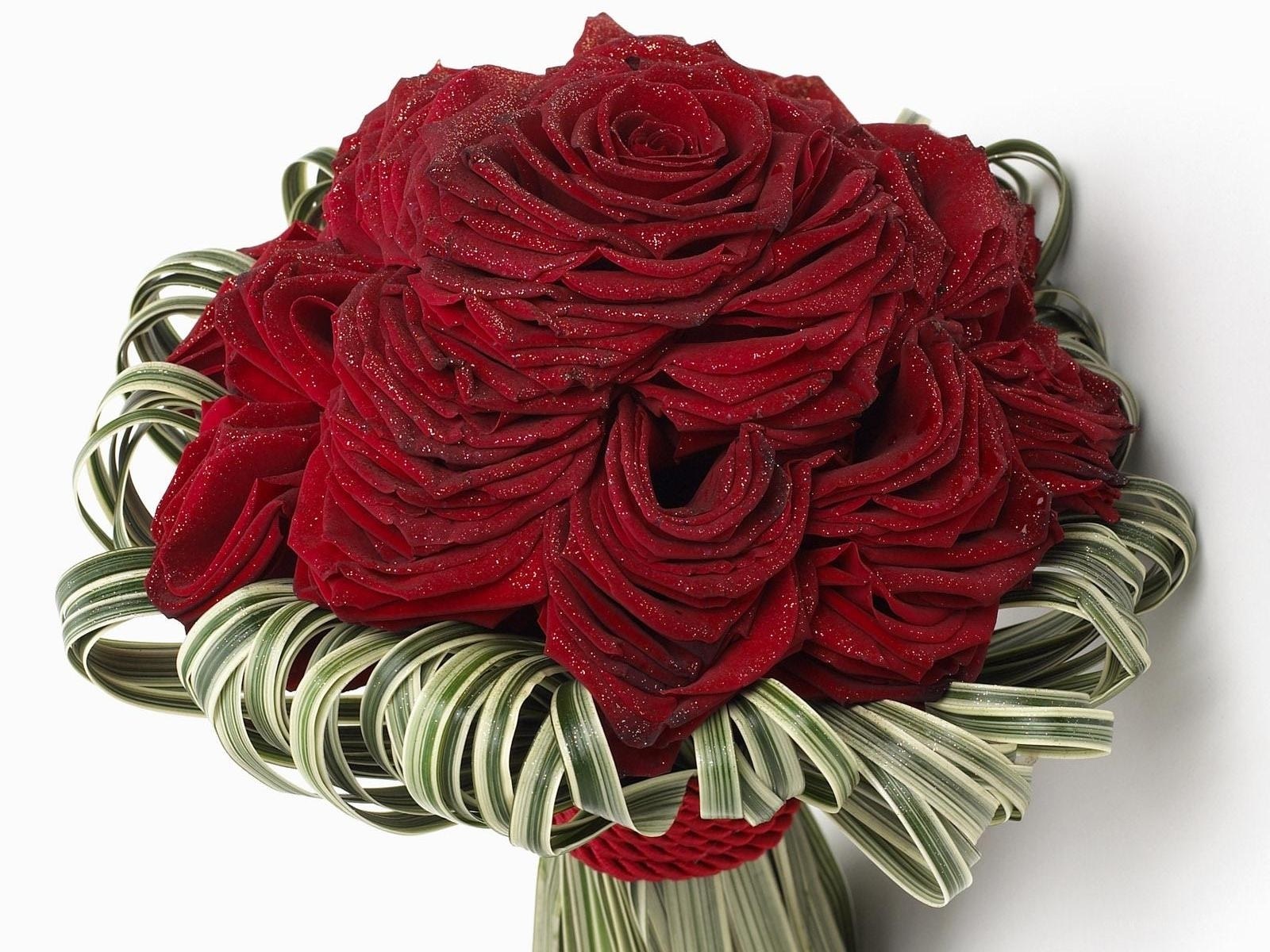 Red rose bouquet with green ribbons