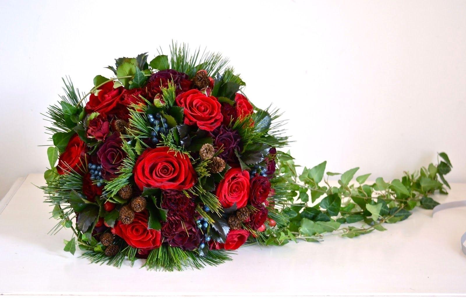 red rose bouquet with greenery