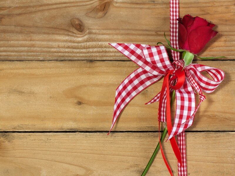 Red Rose with Ribbon — Calm, Photograph, Wooden Surface, Green Stem