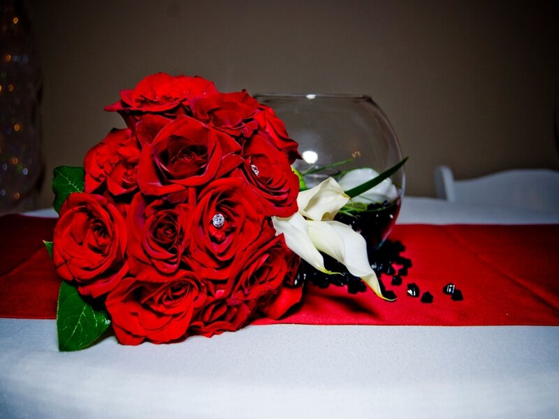 red roses bouquet on table