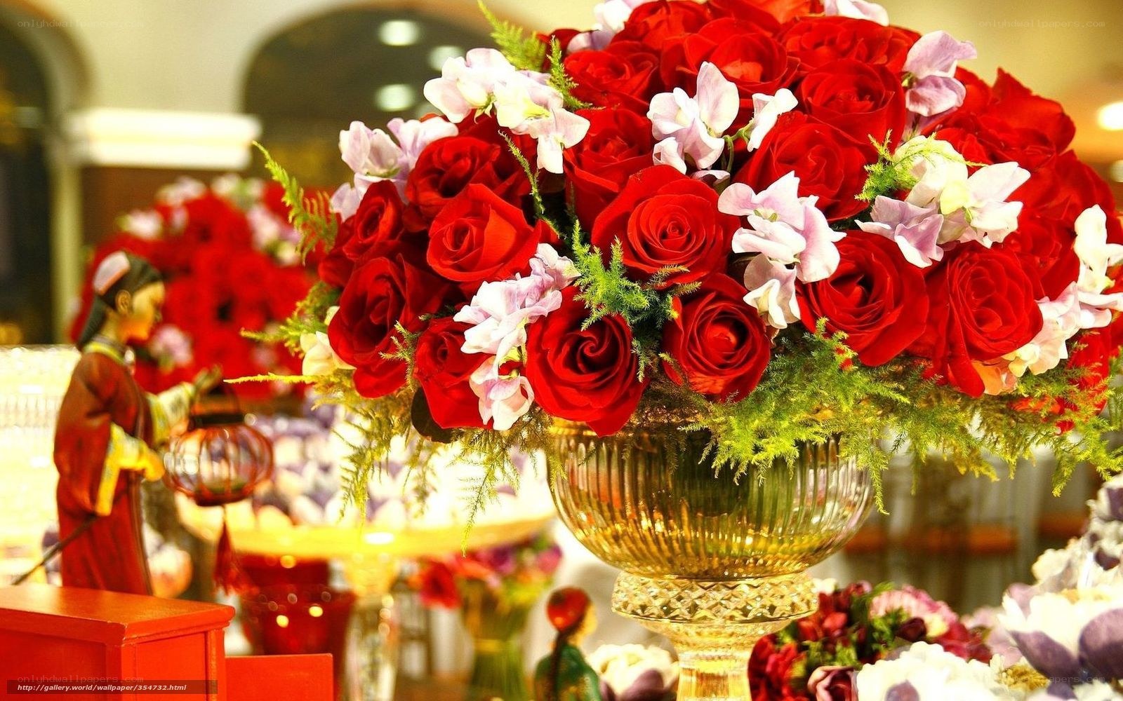 Red roses in a glass vase