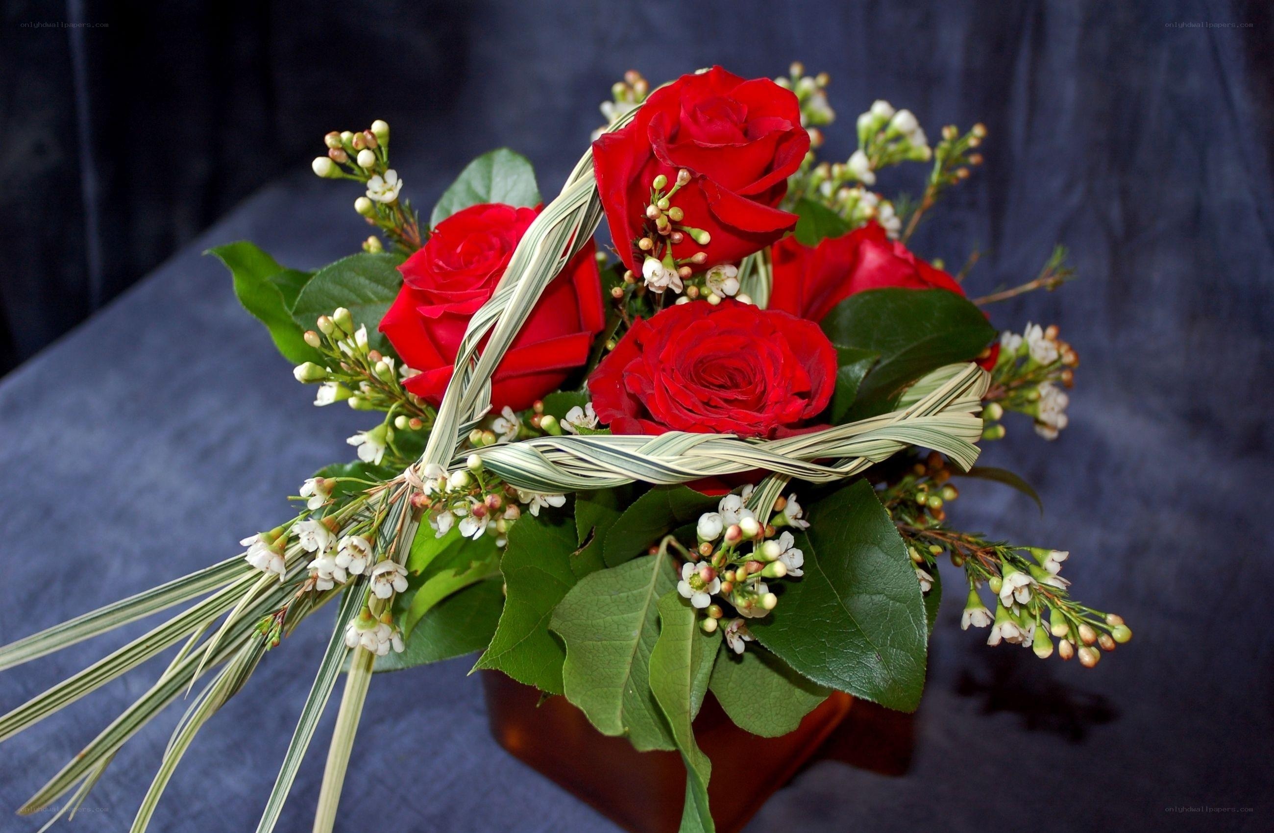 Red roses in a woven basket