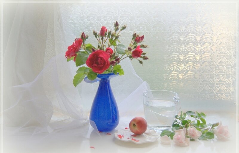 Red Roses in Blue Vase