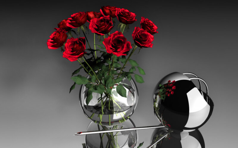 Red roses in glass vase
