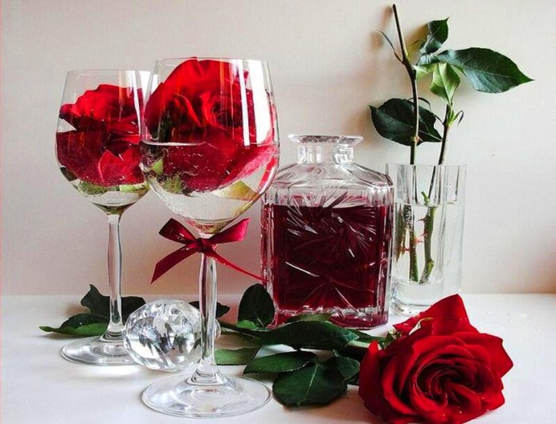 Red Roses in Glassware