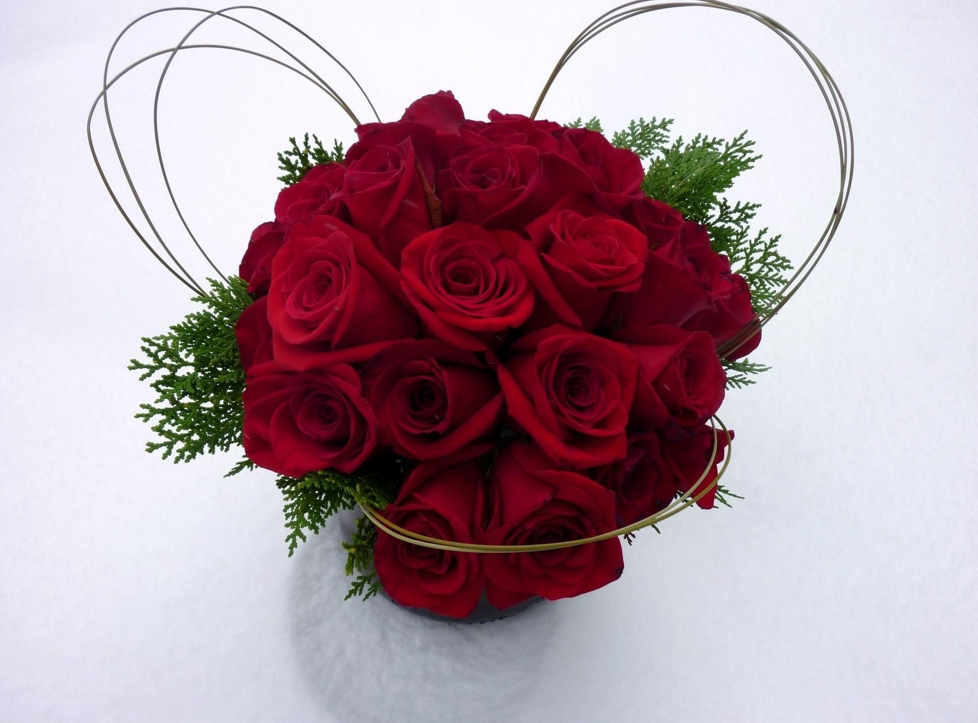Red roses in heart arrangement