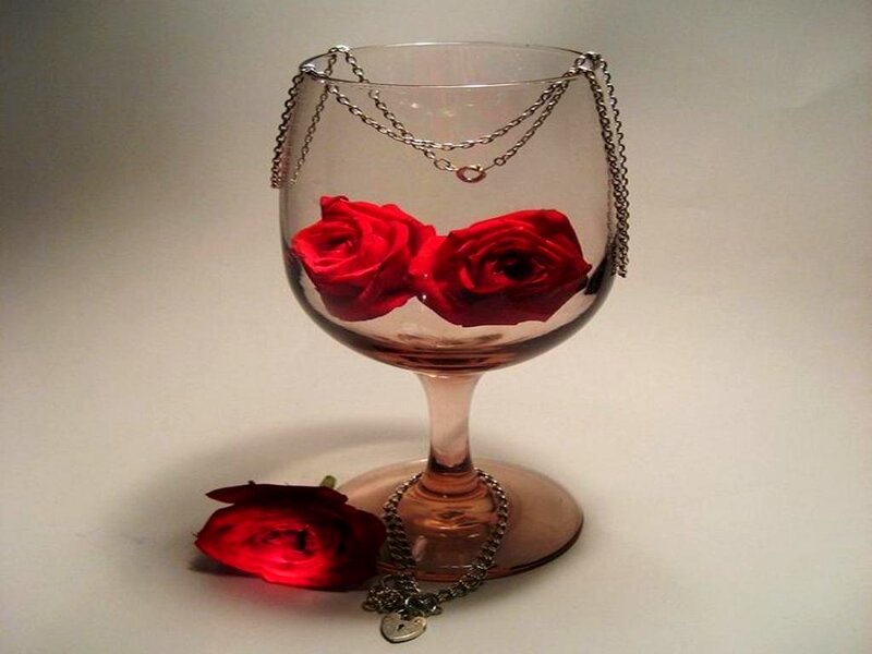 Red Roses in Wine Glass