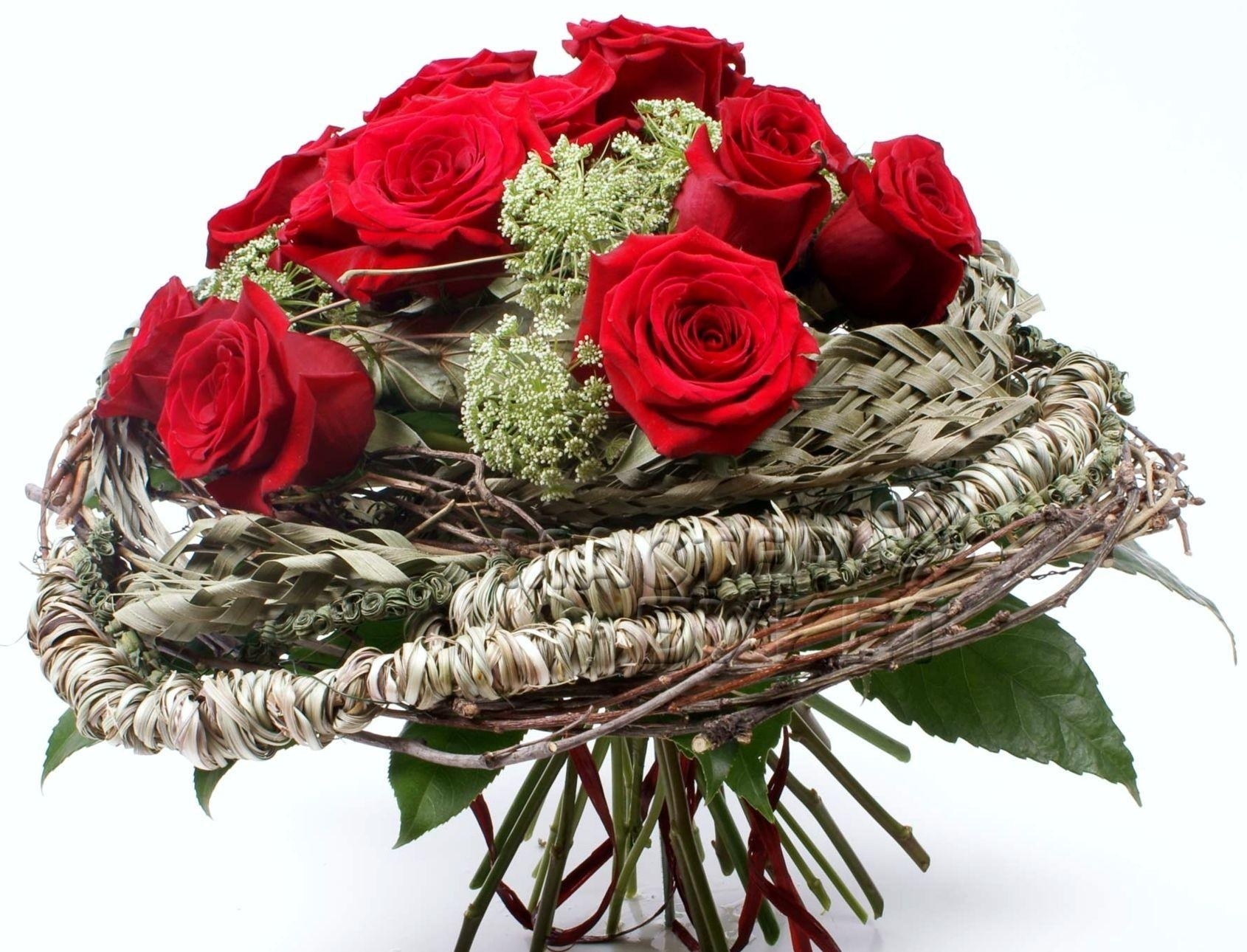red roses in woven basket