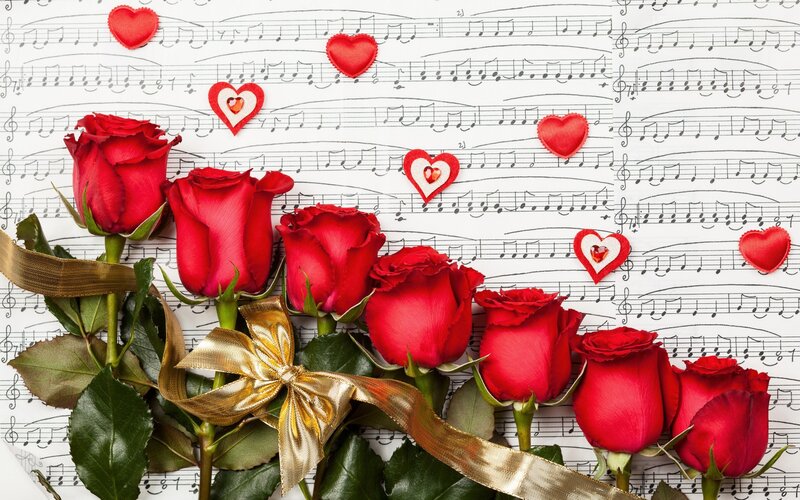 Red Roses on Sheet Music — Romantic, Photograph, Hearts, Ribbon