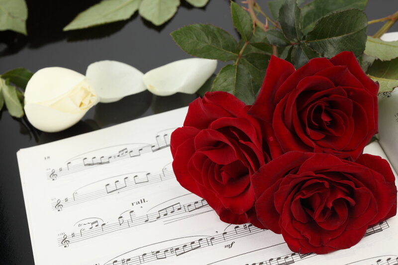 Red Roses on Sheet Music