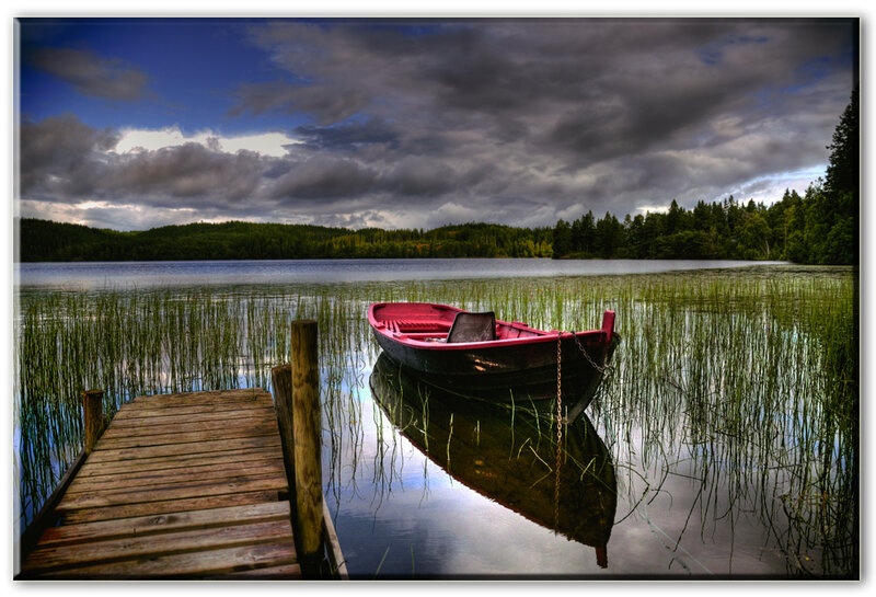 Red Rowboat on Lake — Blue